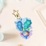 Rainbow acrylic keychain of a pictomancer's spriggan.